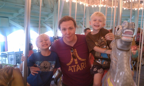 Tim, Ben and Cole on the merry-go-round (08-15-2010 18:51)