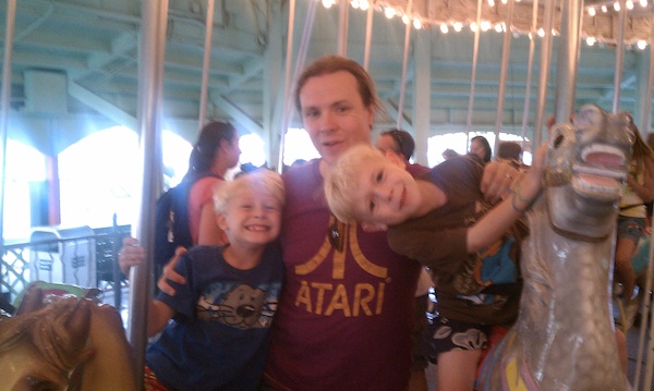 Tim, Ben and Cole on the merry-go-round (08-15-2010 18:51)