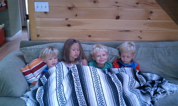 Solomon, Linnea, Tim and Cole on the couch (08-21-2010 07:24)