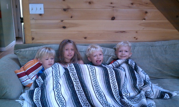 Solomon, Linnea, Tim and Cole on the couch (08-21-2010 07:24)