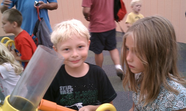 Tim and Linnea with the pneumatic cannon (08-21-2010 12:09)