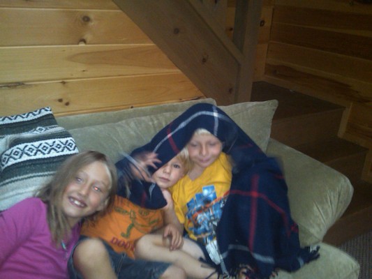 Linnea, Solomon, and Tim cuddling (08-23-2010 07:49)