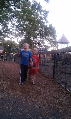 Tim and Cole walking laps holding hands (08-27-2010 19:33)