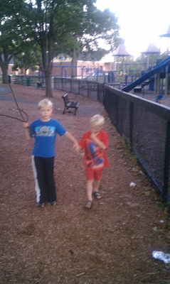 Tim and Cole walking laps holding hands (08-27-2010 19:33)