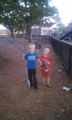 Tim and Cole walking laps holding hands (08-27-2010 19:34)