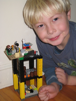 Tim and his Lego house (12-31-2010 07:52)