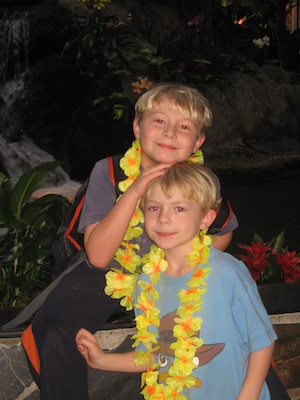 Tim and Cole with leis at the Polynesian (02-26-2011 13:59)