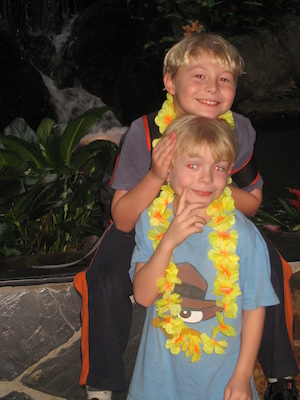 Tim and Cole with leis at the Polynesian (02-26-2011 14:00)