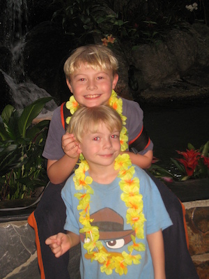 Tim and Cole with leis at the Polynesian (02-26-2011 14:00)