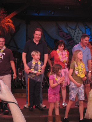 Tim and Ben celebrating their birthdays at the luau (02-26-2011 18:12)