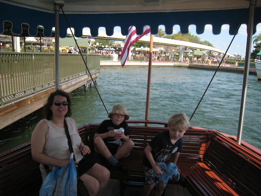 Xine, Tim and Cole on the ferry from the MK to Polynesian (02-27-2011 12:54)
