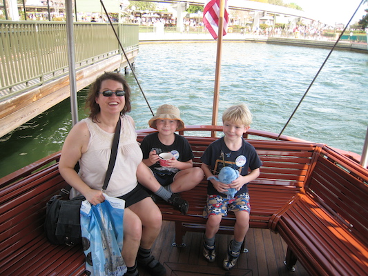 Xine, Tim and Cole on the ferry from the MK to Polynesian (02-27-2011 12:54)
