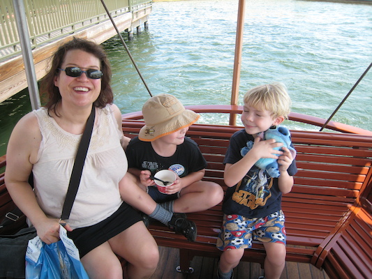 Xine, Tim and Cole on the ferry from the MK to Polynesian (02-27-2011 12:54)