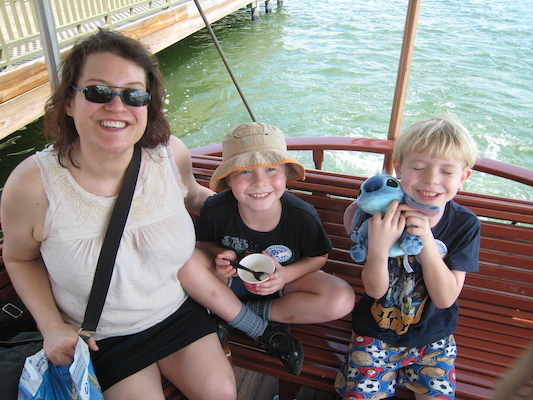 Xine, Tim and Cole on the ferry from the MK to Polynesian (02-27-2011 12:54)