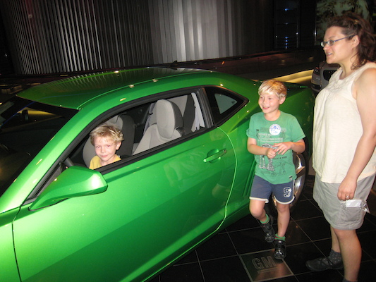 Cole, Tim and Xine with a Camaro (02-28-2011 11:09)