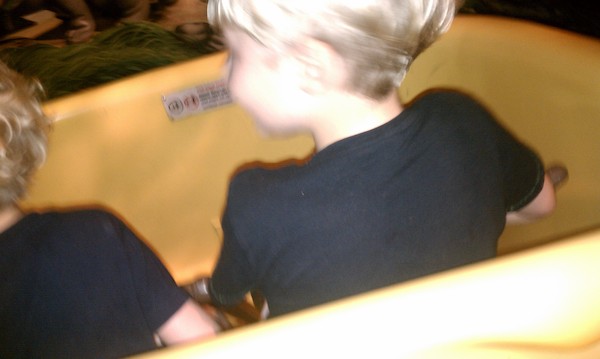 Cole and Tim on the Pooh ride (02-27-2011 09:30)