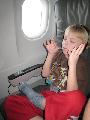 Cole meditates on the plane (03-02-2011 16:28)