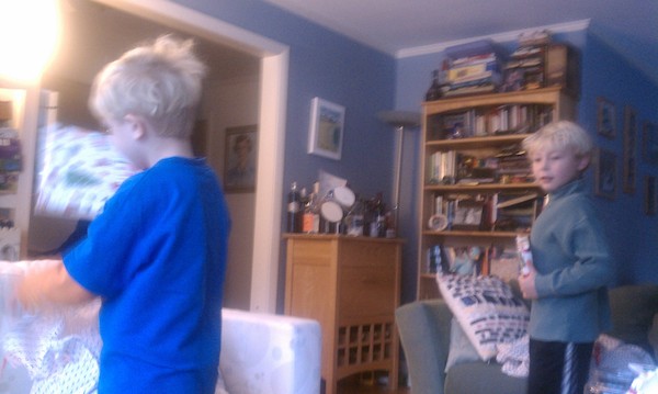 Cole and Tim opening presents (12-25-2010 07:49)