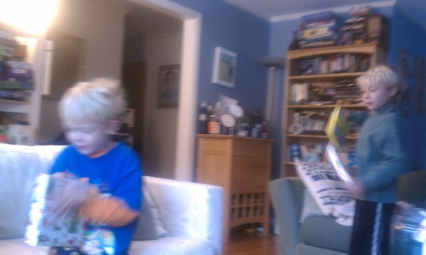 Cole and Tim opening presents (12-25-2010 07:49)