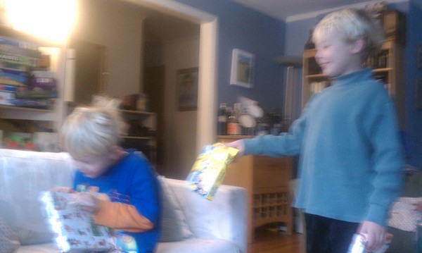 Cole and Tim opening presents (12-25-2010 07:49)