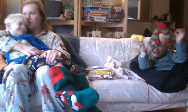 Ben, Cole and Tim opening presents (12-25-2010 07:57)
