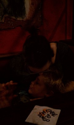 Xine kissing Tim at dinner (02-25-2011 18:03)