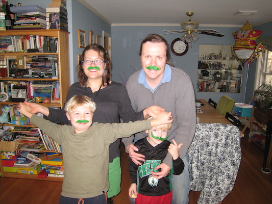 Xine, Ben, Tim, Cole in green moustaches (03-17-2011 16:14)