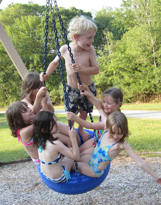 Cole and the girls swinging on his birthday (06-16-2011 06:52)