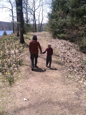 IMG_20110508_130251 - Xine and Cole looking at daffodils (05-08-2011 13:02)