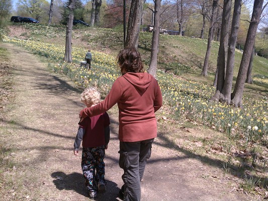 IMG_20110508_130558 - Xine and Cole looking at daffodils (05-08-2011 13:05)
