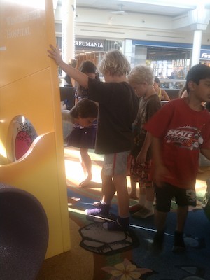 IMG_20110607_181724 - Cole and Tim at the mall playground (06-07-2011 18:17)