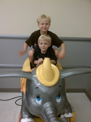 IMG_20110619_103315 - Tim and Cole on Dumbo (06-19-2011 10:33)