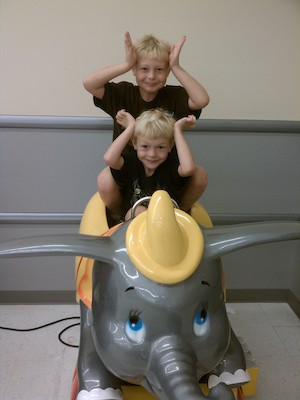 IMG_20110619_103318 - Tim and Cole on Dumbo (06-19-2011 10:33)