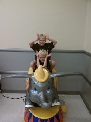 IMG_20110619_103325 - Tim and Cole on Dumbo (06-19-2011 10:33)