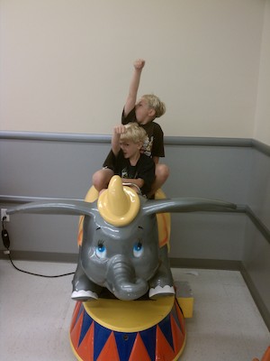 IMG_20110619_103342 - Tim and Cole on Dumbo (06-19-2011 10:33)