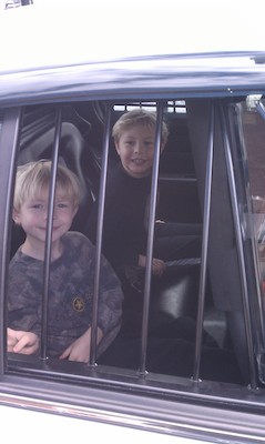 IMAG0632 - Cole and Tim in a police car (03-19-2011 13:31)