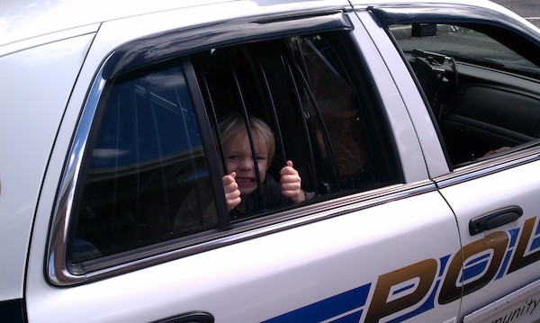 IMAG0637 - Cole in a police car (03-19-2011 13:32)