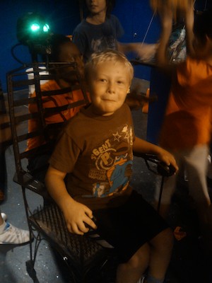 Tim on a chair of nails (07-25-2011 11:25)