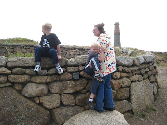 Tim, Cole and Xine looking at a mine shaft (07-16-2011 12:28)