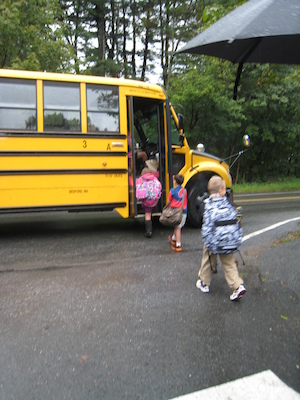 First day of school, boarding the bus (09-06-2011 08:56)