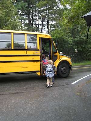First day of school, boarding the bus (09-06-2011 08:56)