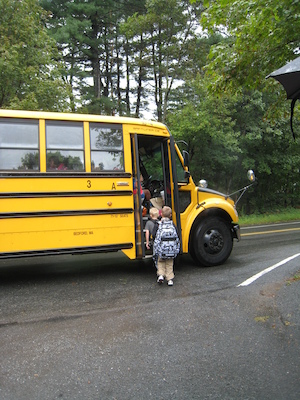 First day of school, boarding the bus (09-06-2011 08:56)