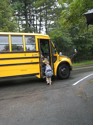 First day of school, boarding the bus (09-06-2011 08:56)