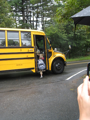 First day of school, boarding the bus (09-06-2011 08:56)
