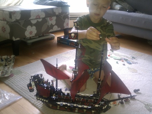 Cole building the Lego Queen Anne's Revenge (08-13-2011 08:18)