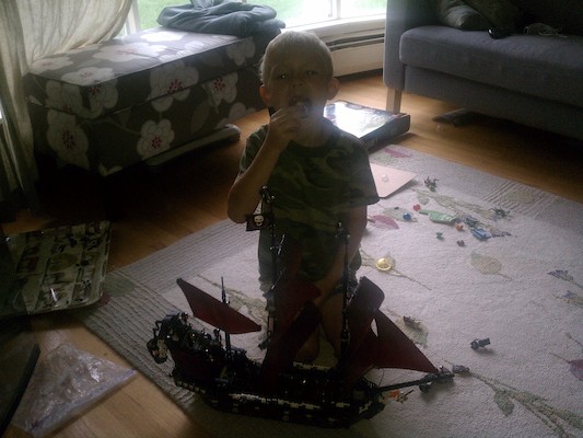 Cole building the Lego Queen Anne's Revenge (08-13-2011 08:19)