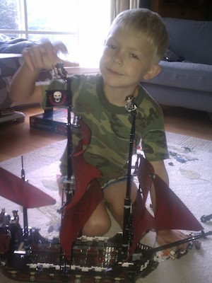 Cole building the Lego Queen Anne's Revenge (08-13-2011 08:19)