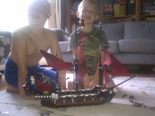 Tim and Cole building the Lego Queen Anne's Revenge (08-13-2011 08:20)