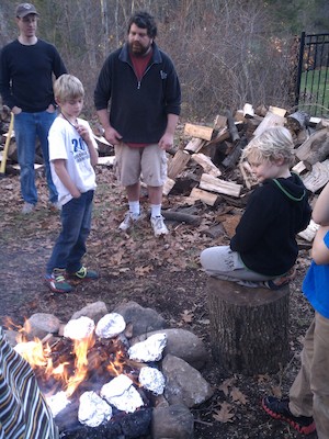 Scout Tim watching the food cook (11-20-2011 15:37)