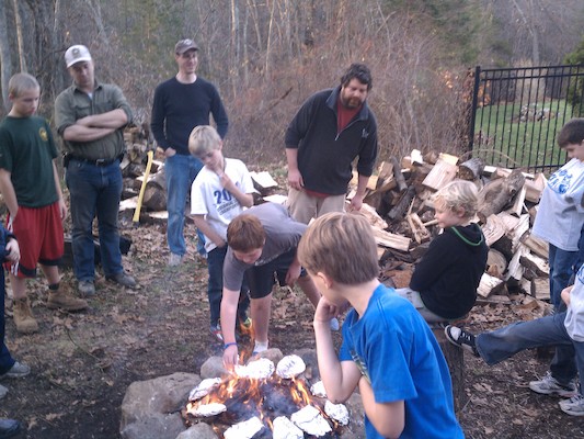 Scout Tim watching the food cook (11-20-2011 15:37)